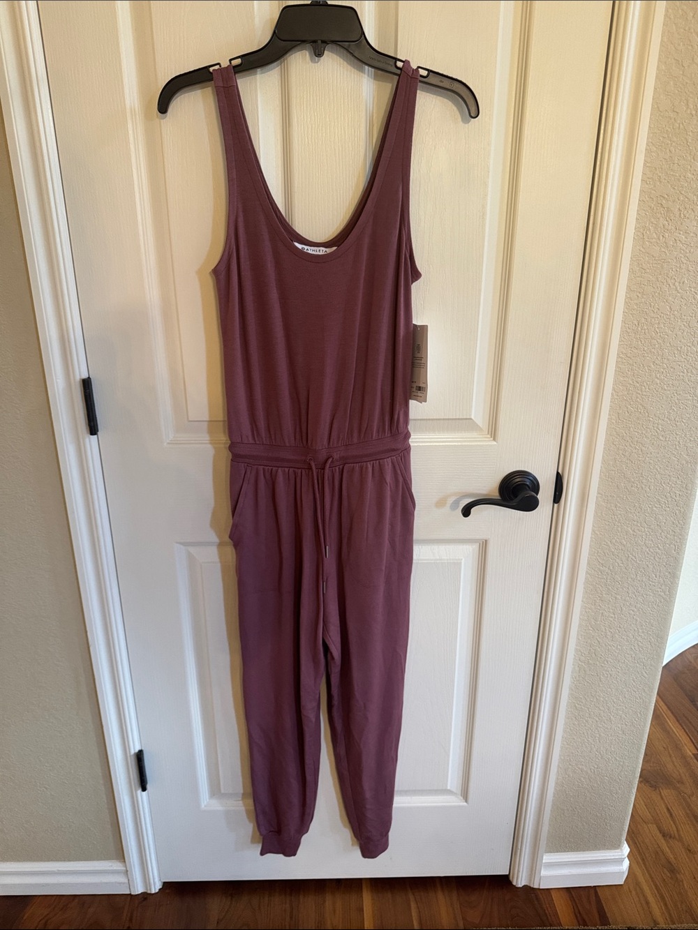 NWT Athleta Balance Jumpsuit. Mauve color size XXS.